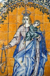 Evora museum. Azulejos. Saint Dominic mottar rosenkransen fra jomfruen. Portugal.