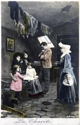 Veldedighetsorganisasjonen: nonne besøker fattige mennesker, ca. 1910 (postkort)