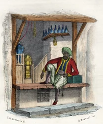 Arab merchant in front of his shop, Algiers