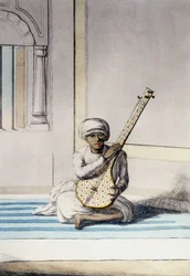 Kultur, sivilisasjon og indisk samfunn: Musiker som spiller Thambourah (Tamboura), tradisjonelt instrument i India. Gravering 1808.
