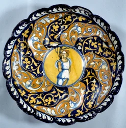 Godronnee fajansekopp dekorert av en angelot. Paris fra 1500-tallet, Louvre-museet