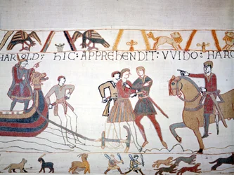 Harold II (1022 - 1066) landet i Normandie hvor han ble tatt til fange av Vilhelm I Erobreren (1027 - 1087). Bayeux-teppe, kjent som Broderi av Dronning Mathilde