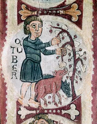 Månedens syklus: Oktober: samlingen av eikenøtter. Detalj av en freske fra 1100-tallet fra Royal Pantheon of the Real Colegiata of San Isidoro (Royal Collegiale of Saint Isidore). Leon.