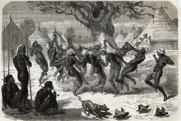 Velkomstdans av kvinnene i stammen, når Baker og hans kone kommer tilbake fra Lake Albert (Albert Nyanza). Engravure pour illustration le voyage au lac Albert, en 1861-1864, av Sir Samuel White Baker, i "Le tour du monde, nouveau journal des voyages
