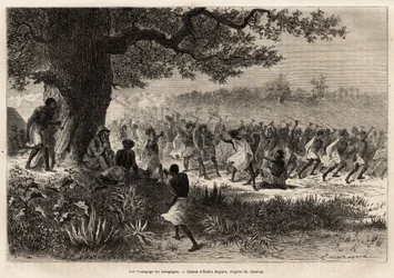 Vouagogo (stammen i Tanzania) som forberedelse til krig, under treet, forfatteren av historien Henry Morton Stanley (1841-1904). Gravering for å illustrere reisen på jakt etter Livingstone, i Sentral-Afrika, av Henry Stanley, korrespondent for "New-Y