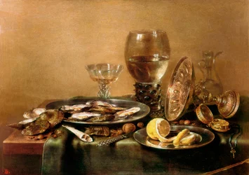 Stilleben med østers, sitron, glass og gullservise