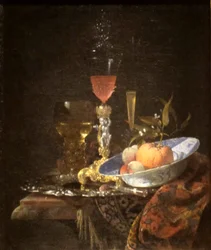 Vinglass og en skål med frukt