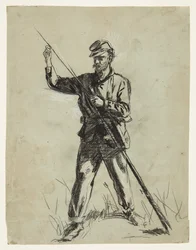 Kavalerisoldat laster en rifle