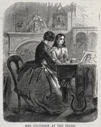 Fru Otcheson ved pianoet